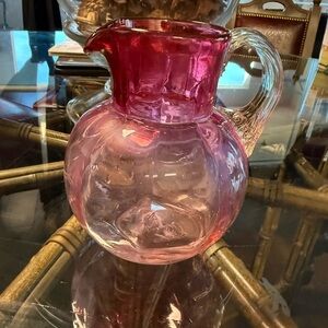 Fenton Vintage hand blown cranberry glass pitcher with clear handle